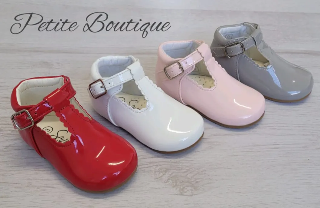 Pink patent t-bar shoes